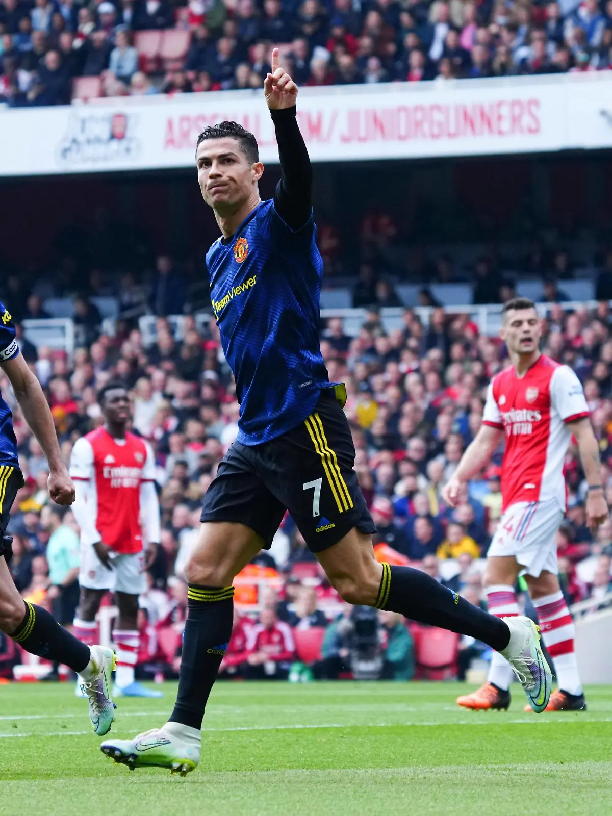 Mandatory Credit: Photo by Javier Garcia/Shutterstock 12905316j Cristiano Ronaldo of Manchester United, ManU celebrates scoring a goal after making it 1-2 Arsenal v Manchester United, Premier League, Football, Emirates Stadium, London, UK - 23 Apr 2022 EDITORIAL USE ONLY No use with unauthorised audio, video, data, fixture lists, club/league logos or live services. Online in-match use limited to 120 images, no video emulation. No use in betting, games or single club/league/player publications. Arsenal v Manchester United, Premier League, Football, Emirates Stadium, London, UK - 23 Apr 2022 EDITORIAL USE ONLY No use with unauthorised audio, video, data, fixture lists, club/league logos or live services. Online in-match use limited to 120 images, no video emulation. No use in betting, games or single club/league/player publications. PUBLICATIONxINxGERxSUIxAUTXHUNxGRExMLTxCYPxROMxBULxUAExKSAxONLY Copyright: xJavierxGarcia/Shutterstockx 12905316j