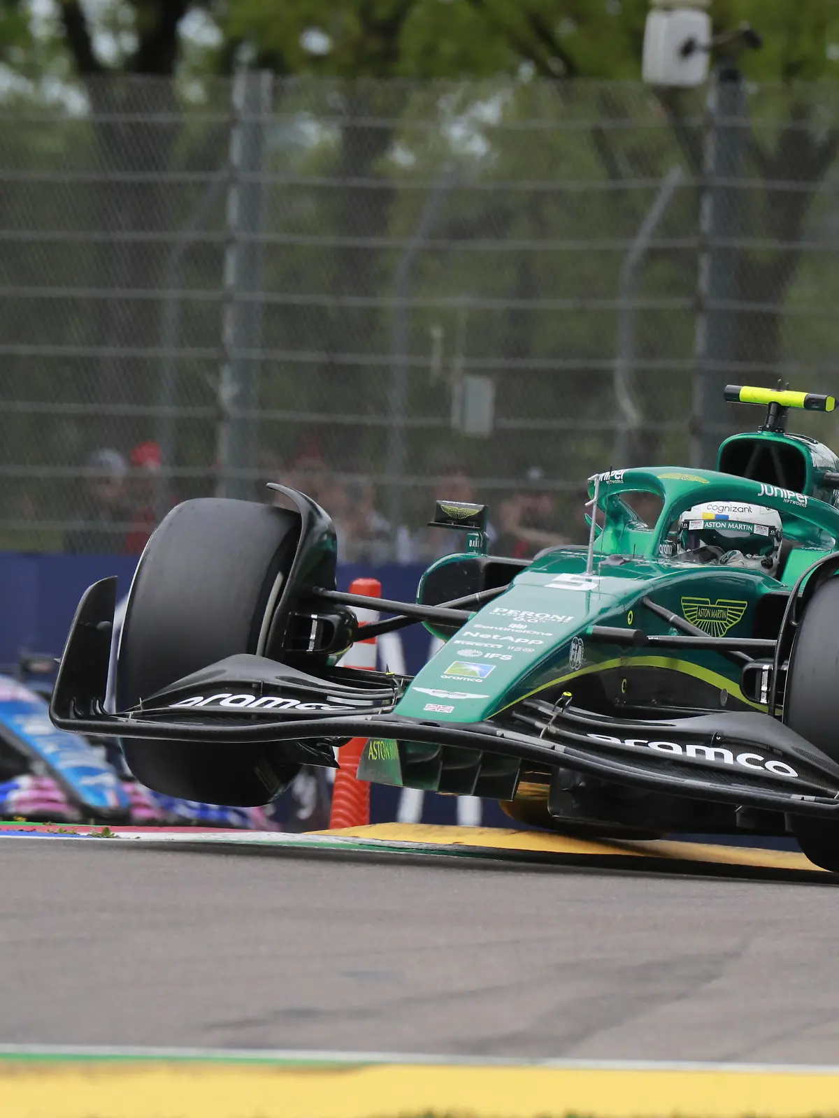  Formula 1 2022: Emilia Romagna GP AUTODROMO INTERNAZIONALE ENZO E DINO FERRARI, ITALY - APRIL 23: Sebastian Vettel, Aston Martin AMR22, leads Esteban Ocon, Alpine A522 during the Emilia Romagna GP at Autodromo Internazionale Enzo e Dino Ferrari on Saturday April 23, 2022 in imola, Italy. Photo by Steven Tee / LAT Images Images PUBLICATIONxINxGERxSUIxAUTxHUNxONLY GP2204_112527_1ST7114