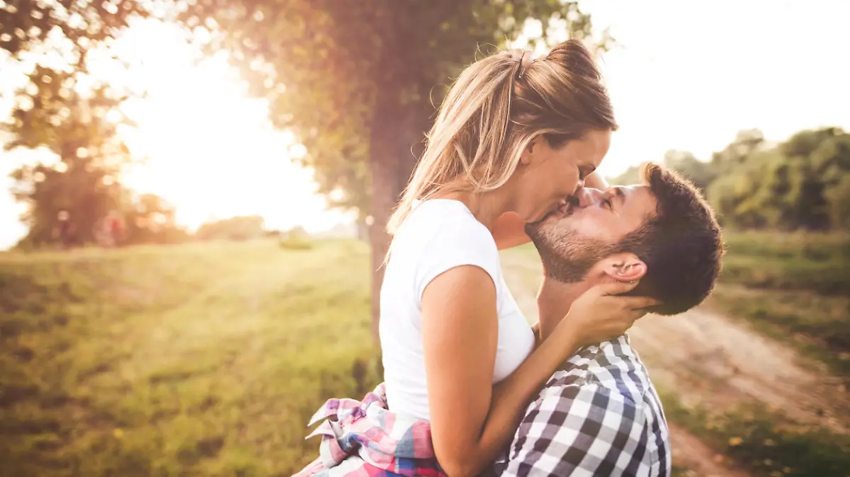Photo of young couple enjoying in love