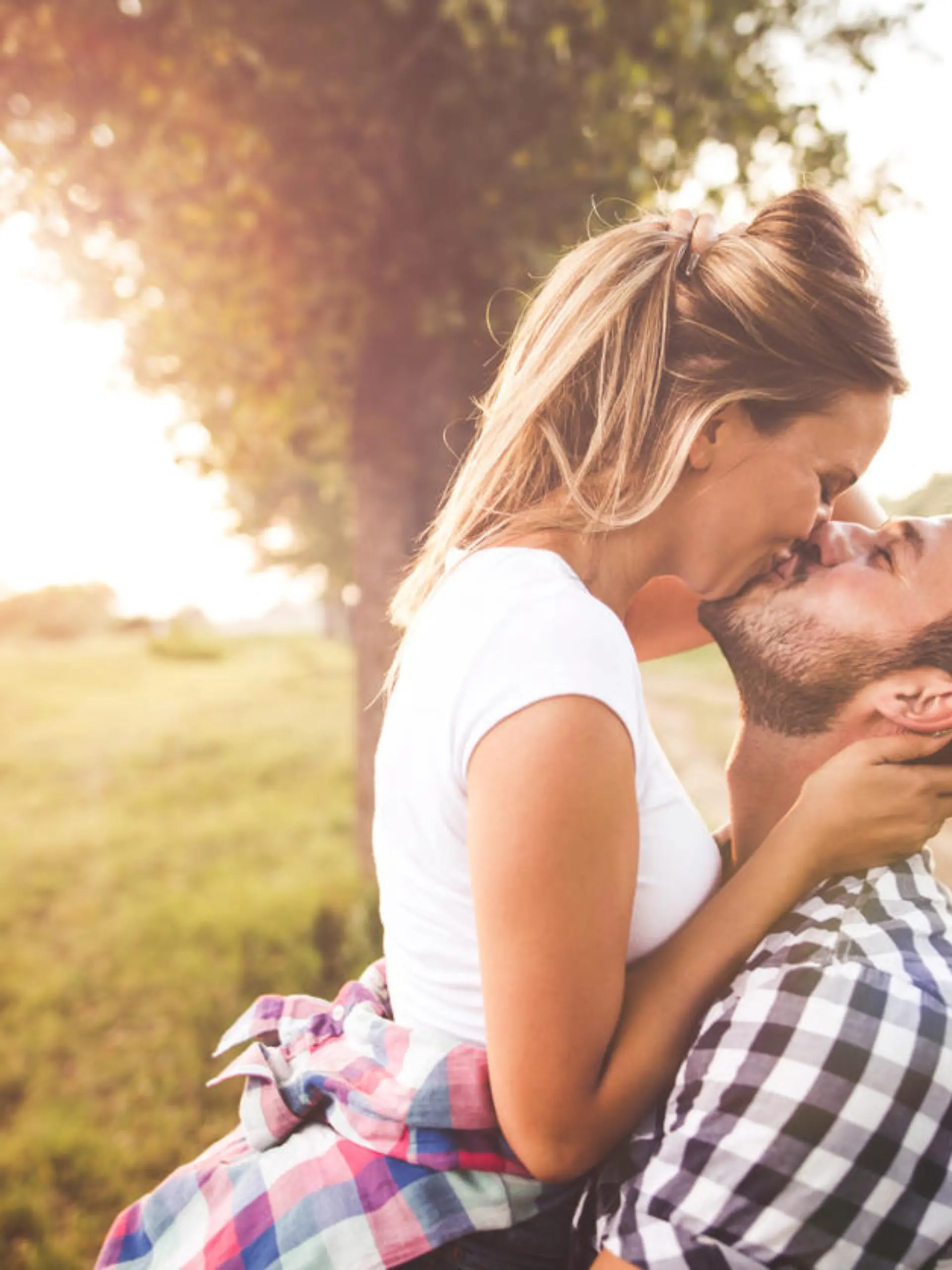 Photo of young couple enjoying in love