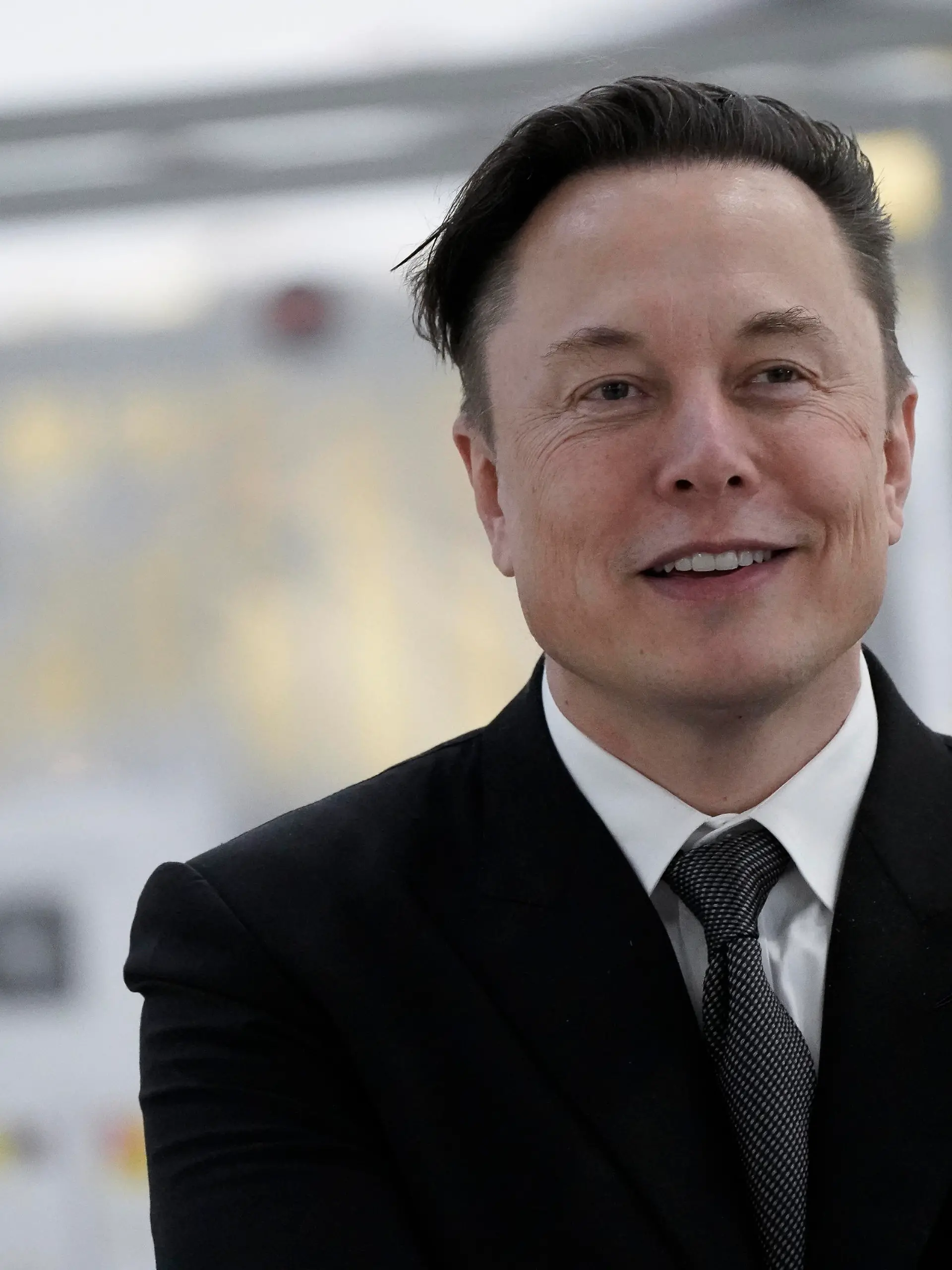Aktuell, 22.03.2022, Gruenheide, Elon Musk Tesla-Chef im Portrait beim 'Tesla Delivery Day' zur Eroeffnung und offiziellem Produktionsstart der Tesla Fabrik, der neuen Gigafactory des Elektroautobauers in Europas groesste E-Autofabrik Gruenheide in der Naehe von Berlin