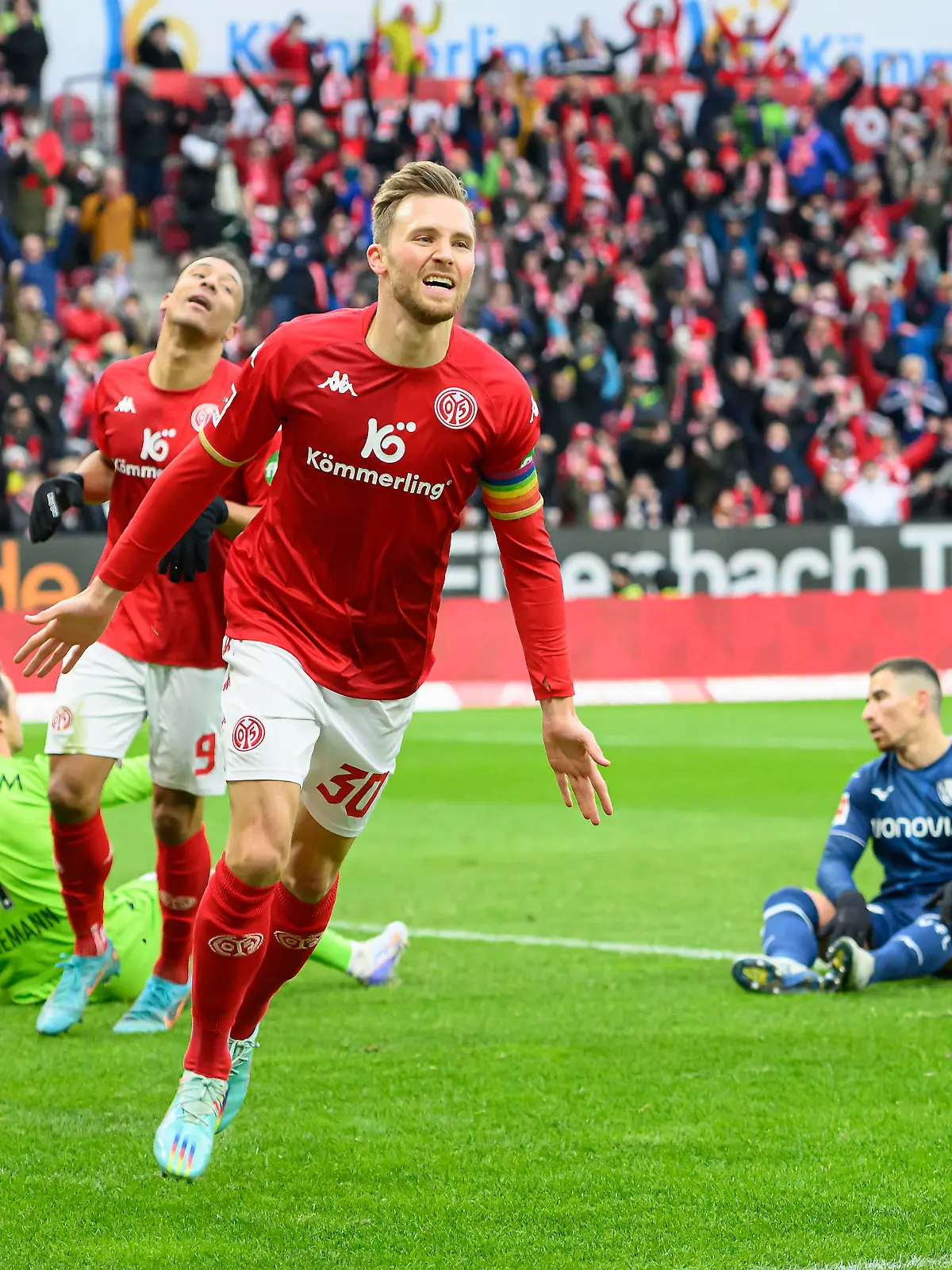 Jubel Silvan WIDMER (MZ) nach seinem Tor zum 2:0, im Hintergrund Torwart Manuel RIEMANN (BO) und Danilo SOARES r. (BO) enttaeuscht Fussball 1. Bundesliga, 18.Spieltag, 1. FSV Mainz 05 (MZ) - VfL Bochum (BO), am 28.01.2023 in Mainz/ Deutschland. #DFL regulations prohibit any use of photographs as image sequences and/or quasi-video #