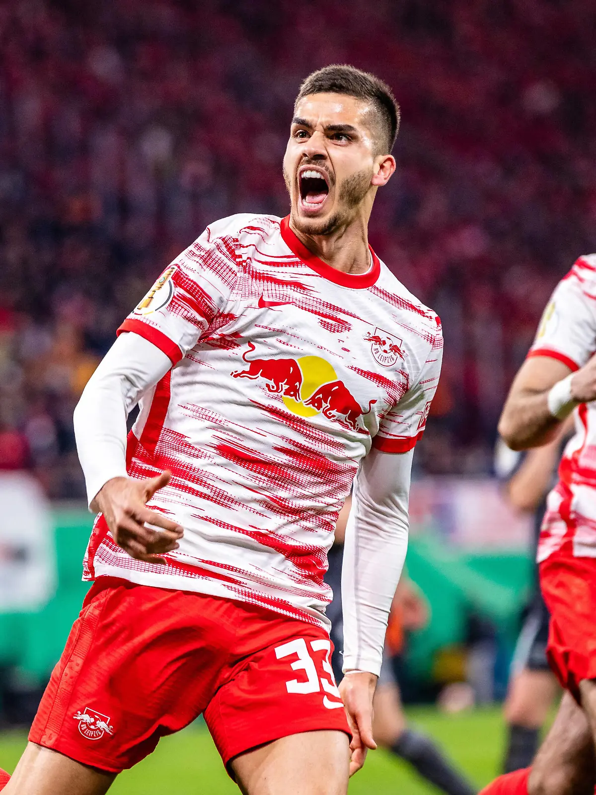  FB-1BL RB Leipzig - 1. FC Union Berlin Andre Silva RB Leipzig jubelt nach Tor zum 1:1 waehrend des Pokal-Halbfinale in der Saison 2021-2022 zwischen RB Leipzig und 1. FC Union Berlin in der Red Bull Arena am 20. April 2022 in Leipzig, Sachsen, Deutschland DFL AND DFB REGULATIONS PROHIBIT ANY USE OF PHOTOGRAPHS as IMAGE SEQUENCES and or QUASI-VIDEO *** FB 1BL RB Leipzig 1 FC Union Berlin Andre Silva RB Leipzig cheers after scoring 1 1 during the cup semifinal in the 2021 2022 season between RB Leipzig and 1 FC Union Berlin at Red Bull Arena on April 20 2022 in Leipzig, Saxony, Germany DFL AND DFB REGULATES PROHIBIT ANY USE OF PHOTOGRAPHS as IMAGE SEQUENCES and or QUASI VIDEO