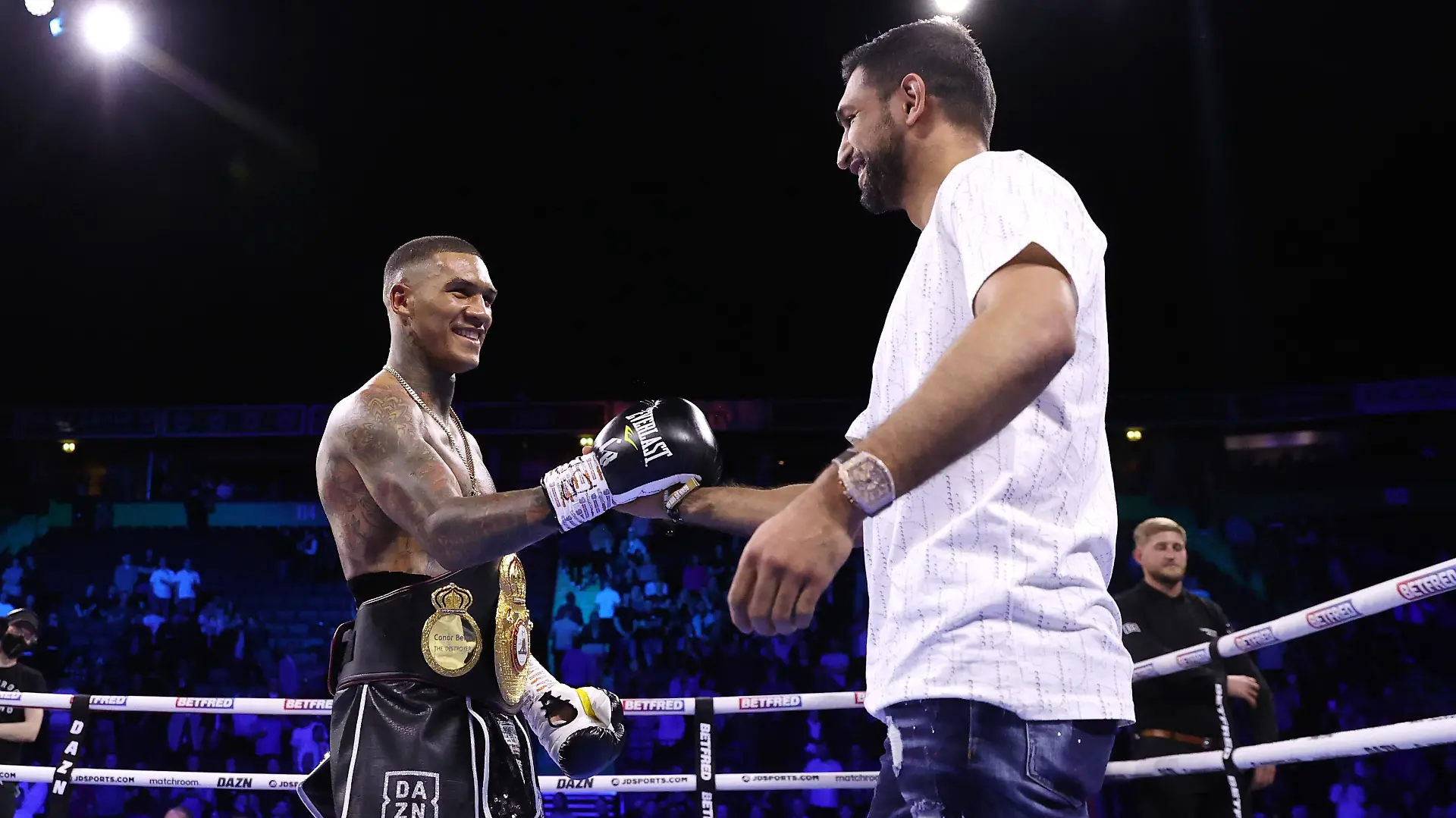 MANCHESTER, ENGLAND - APRIL 16: Conor Benn (L) is congratulated by boxer, Amir Khan following victory in the WBA Continental Welterweight Title fight between Conor Benn and Chris Van Heerden at AO Arena on April 16, 2022 in Manchester, England. (Photo by Alex Livesey/Getty Images)