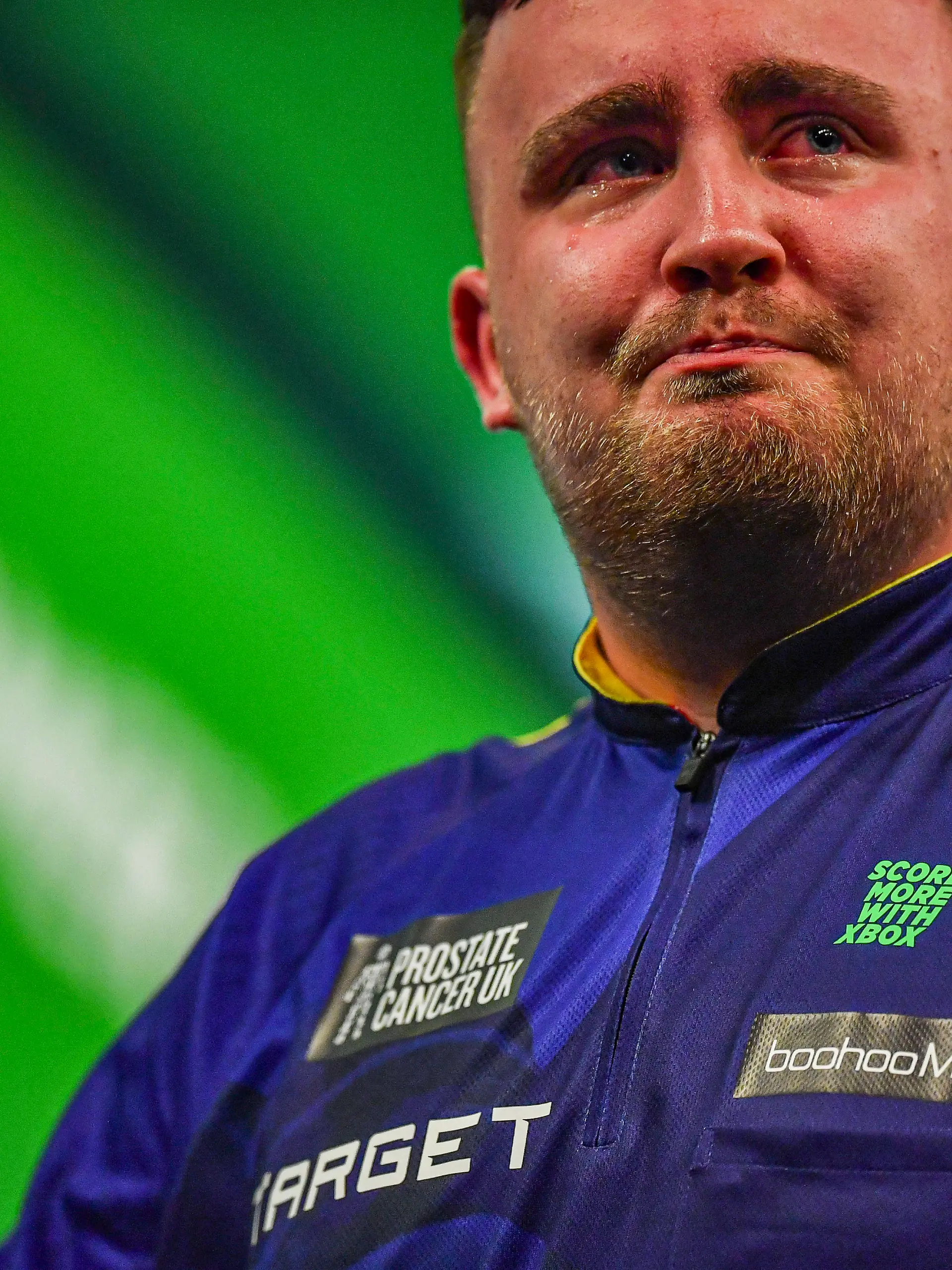 Tränen in den Augen bei Luke Littler während der Darts-WM 2024 im Ally Pally in London.