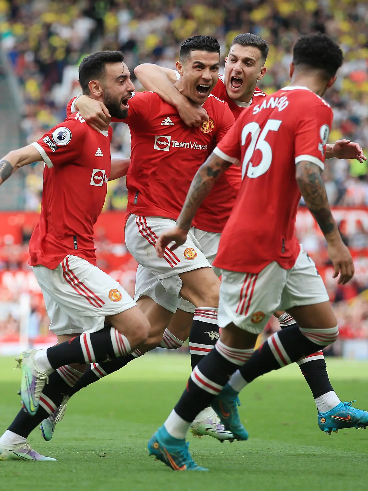 Football - Premier League - Manchester United, ManU v Norwich City 16th April 2022 - Premier League - Manchester United v Norwich City - Cristiano Ronaldo of Manchester United celebrates with Bruno Fernandes of Manchester United L and Diogo Dalot of Manchester United R after scoring their 3rd goal - Photo: Simon Stacpoole / Offside. Manchester UK *** Fußball Premier League Manchester United v Norwich City 16. April 2022 Premier League Manchester United v Norwich City Cristiano Ronaldo von Manchester United feiert mit Bruno Fernandes von Manchester United L und Diogo Dalot von Manchester United R nach seinem dritten Tor Foto Simon Stacpoole Abseits Manchester UK PUBLICATIONxINxGERxSUIxAUTxONLY Copyright: xSimonxStacpoolexOffside 