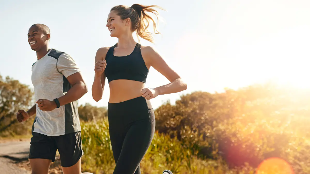 Shot of a fit young couple going for a run outdoors