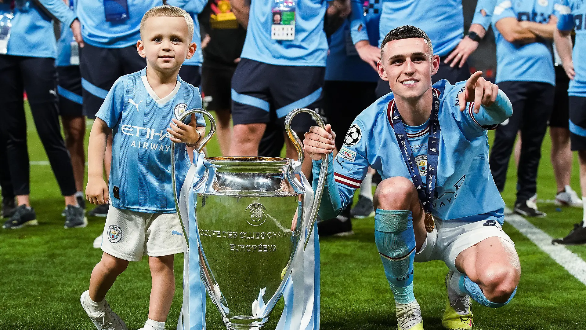 Phil Foden of Manchester City poses with his son Ronnie at the end of the UEFA Champions League final match between Manchester City FC and FC Internazionale at Ataturk Olympic Stadium, Istanbul, Turkey on June 10, 2023. (Photo by Giuseppe Maffia/NurPhoto)