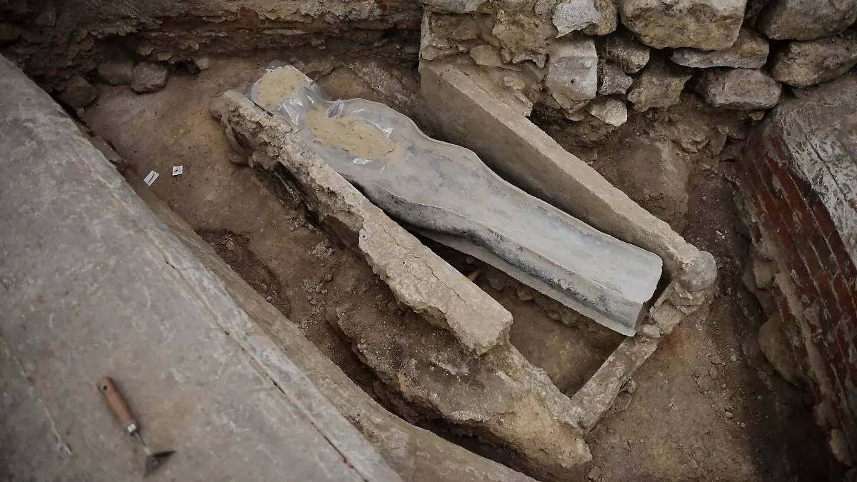 A picture shows a 14th century lead sarcophagus discovered in the floor of Notre Dame Cathedral, in Paris, on March 15, 2022. (Photo by JULIEN DE ROSA / AFP) (Photo by JULIEN DE ROSA/AFP via Getty Images)