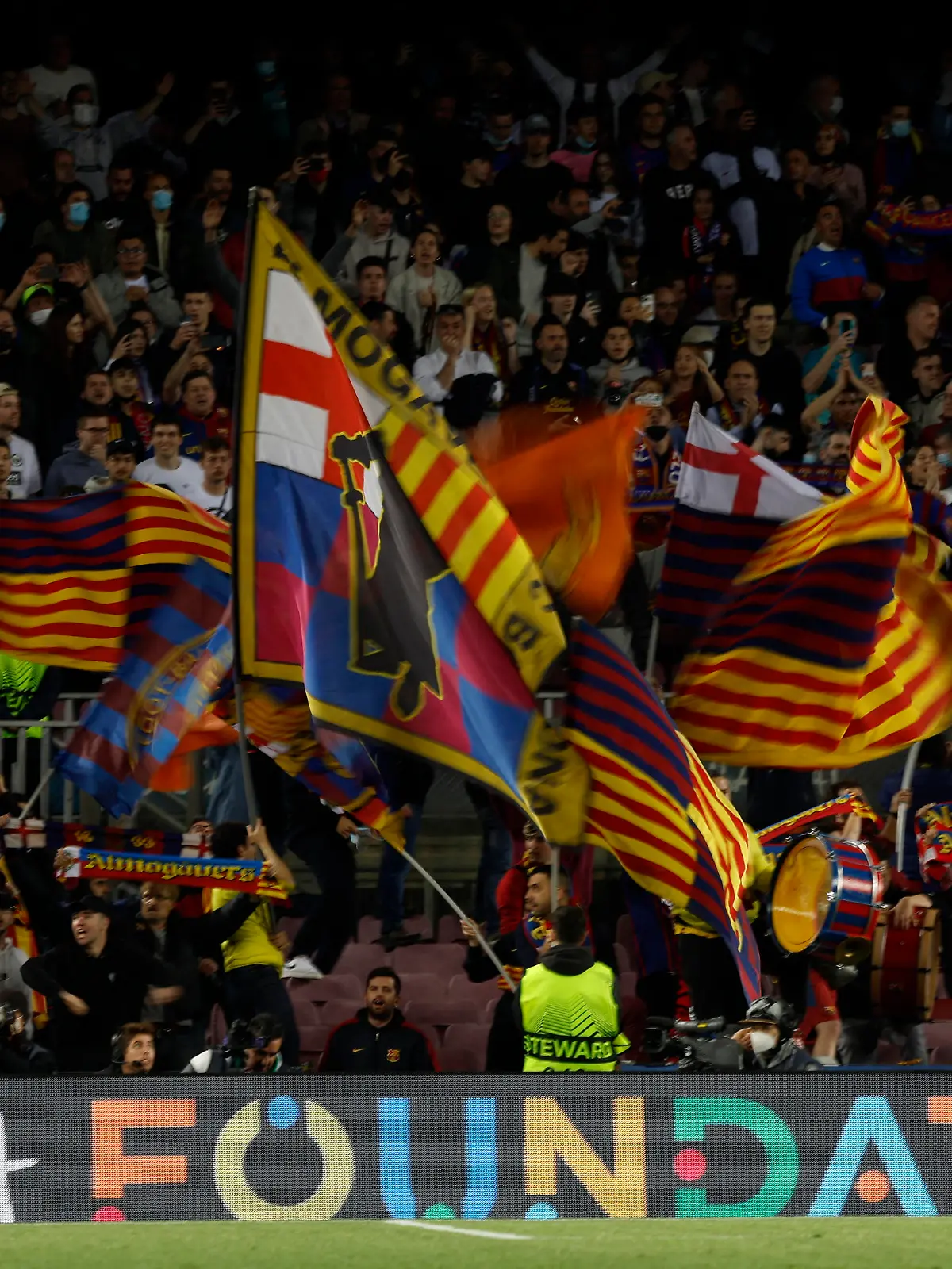 Soccer Football - Europa League - Quarter Final - Second Leg - FC Barcelona v Eintracht Frankfurt - Camp Nou, Barcelona, Spain - April 14, 2022 FC Barcelona fans wave flags before the match REUTERS/Albert Gea