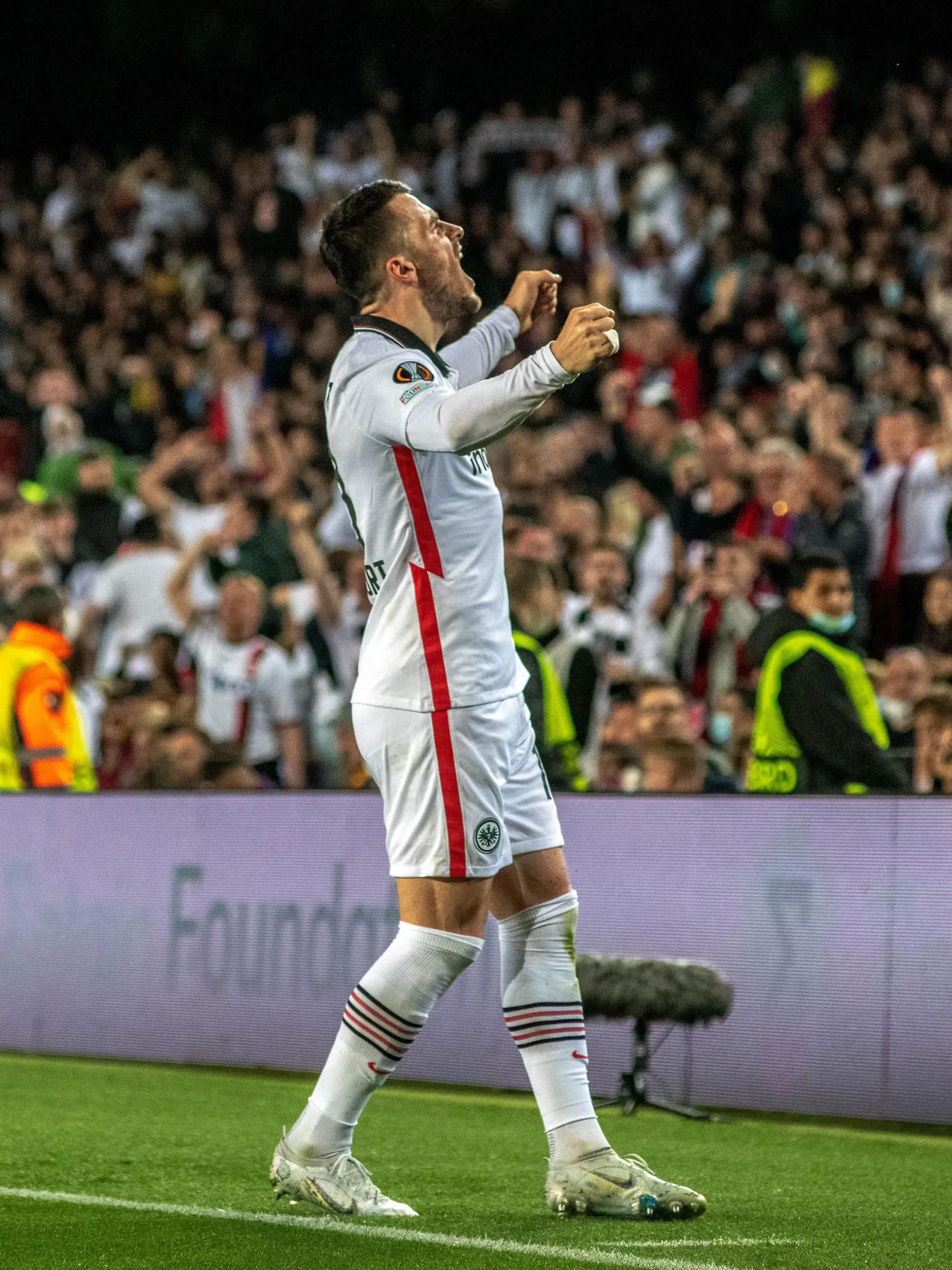BARCELONA, SPAIN - APRIL 14: Filip Kostic (Frankfurt) celebrates the UEFA Europa League quarter Final Second Leg football match between FC Barcelona and Eintracht Frankfurt at the Camp Nou stadium in Barcelona on April 14, 2022. Adria Puig / Anadolu Agency