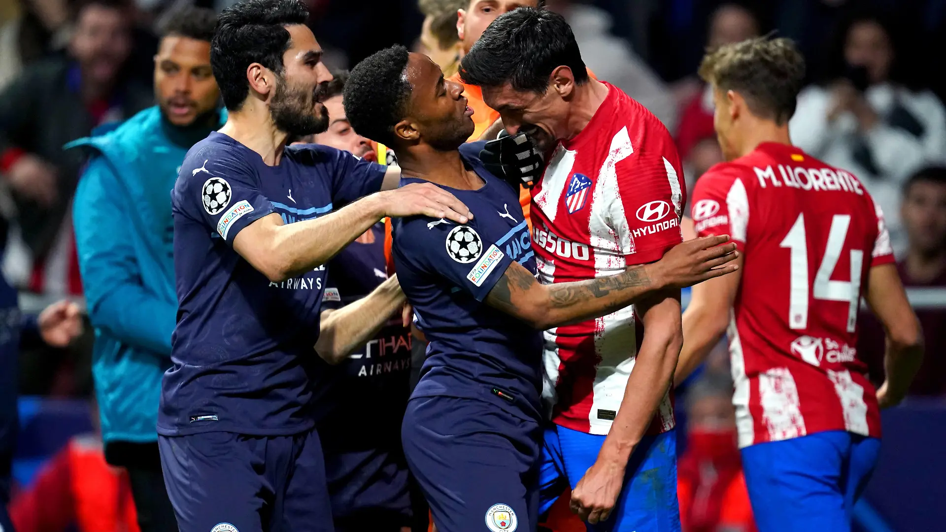 Atletico Madrid v Manchester City - UEFA Champions League - Quarter Final - Second Leg - Wanda Metropolitano Stadium Atletico Madrid s Stefan Savic clashes with Manchester City s Raheem Sterling during the UEFA Champions League quarter final, second leg match at the Wanda Metropolitano Stadium, Madrid. Picture date: Wednesday April 13, 2022. Use subject to restrictions. Editorial use only, no commercial use without prior consent from rights holder. PUBLICATIONxNOTxINxUKxIRL Copyright: xNickxPottsx 66377100