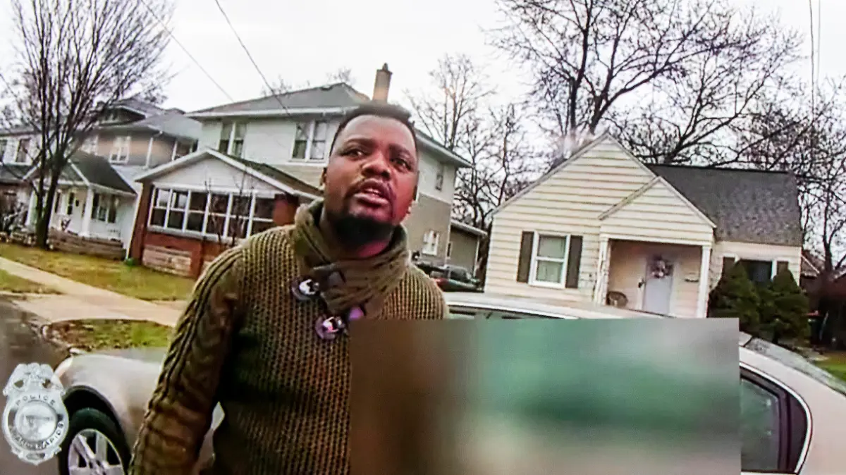 A TV display shows video evidence of a Grand Rapids police officer struggling with and shooting Patrick Lyoya at Grand Rapids City Hall on Wednesday, April 13, 2022. Lyoya, 26, was shot and killed about 8:10 a.m., on April 4, after what police said was a traffic stop. (Grand Rapids Police Department)