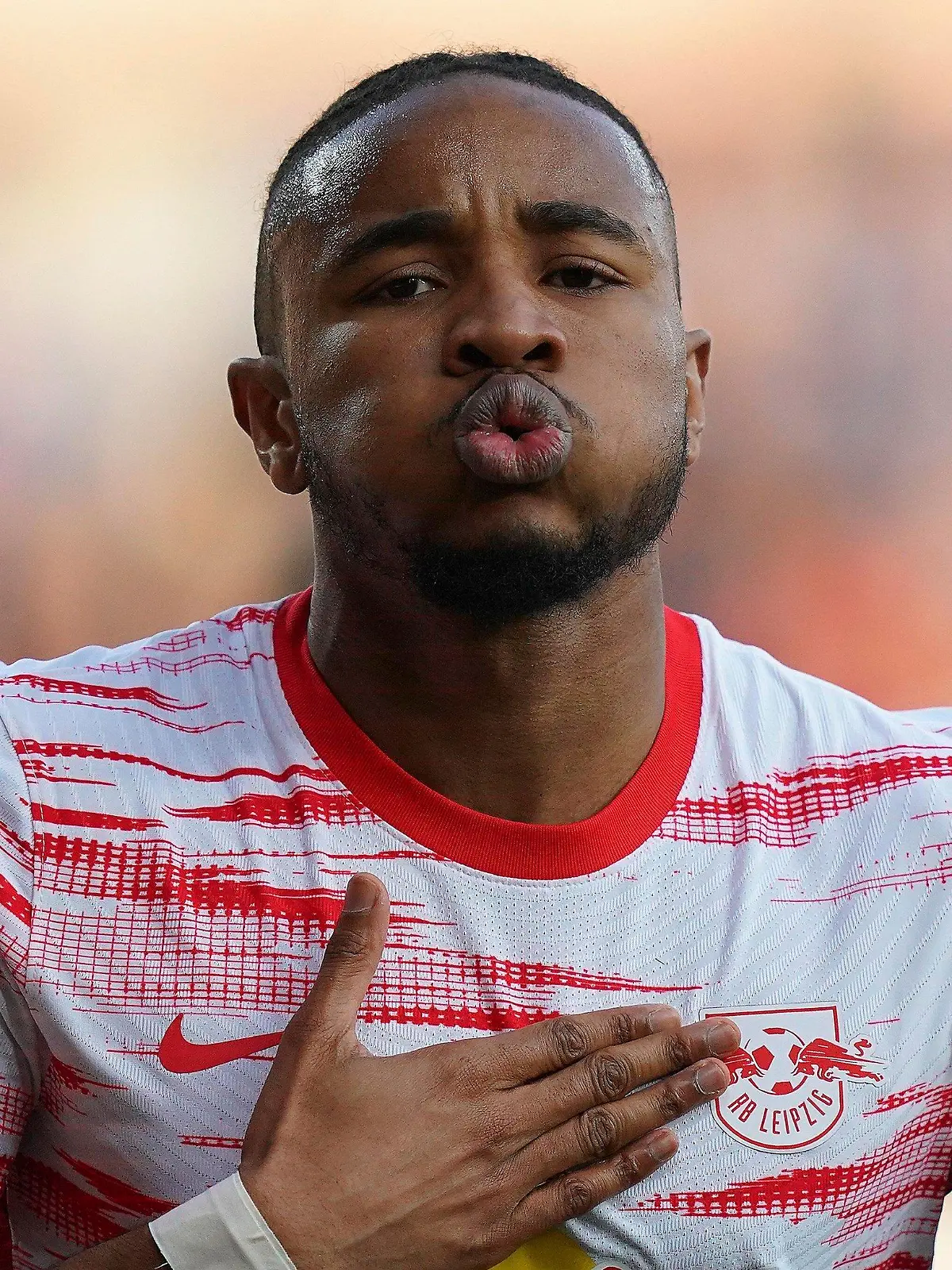 Leipzig's Christopher Nkunku celebrates scoring during the Europa League soccer quarterfinal match between Atalanta and Leipzig at Gewiss Stadium, Bergamo, Italy, Thursday April 14, 2022. (Spada/LaPresse via AP)