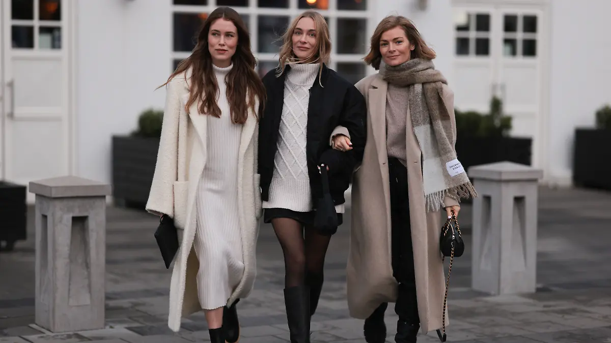 Drei Frauen mit verschiedenen Winter-Looks. 