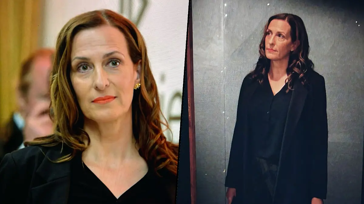 Katrin in schickem schwarzen Longblazer.
