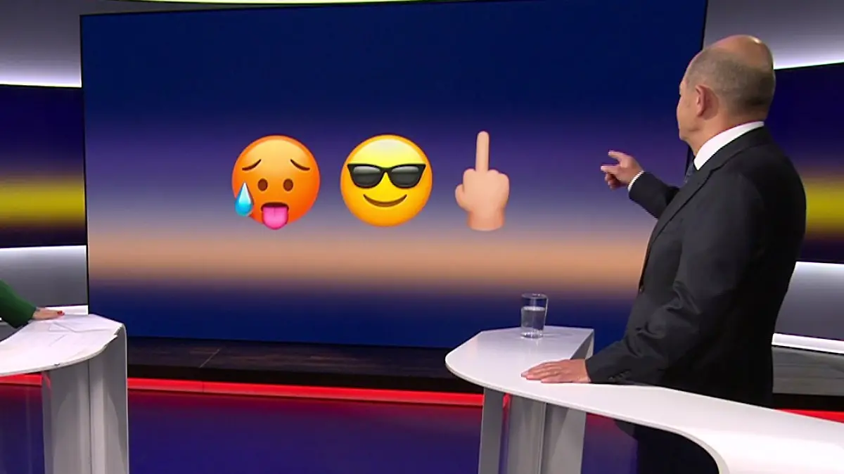 Welches Emoji gibt die Gefühlslage von Bundeskanzler Olaf Scholz gerade am besten wider? Bei RTL Direkt muss sich der SPD-Politiker entscheiden. Im Studio zeigt Pinar Atalay dem 66-Jährigen drei Möglichkeiten: Ein schwitzendes Emoji, eins mit Sonnenbrille und eine Hand mit unrühmlich ausgestrecktem Finger.