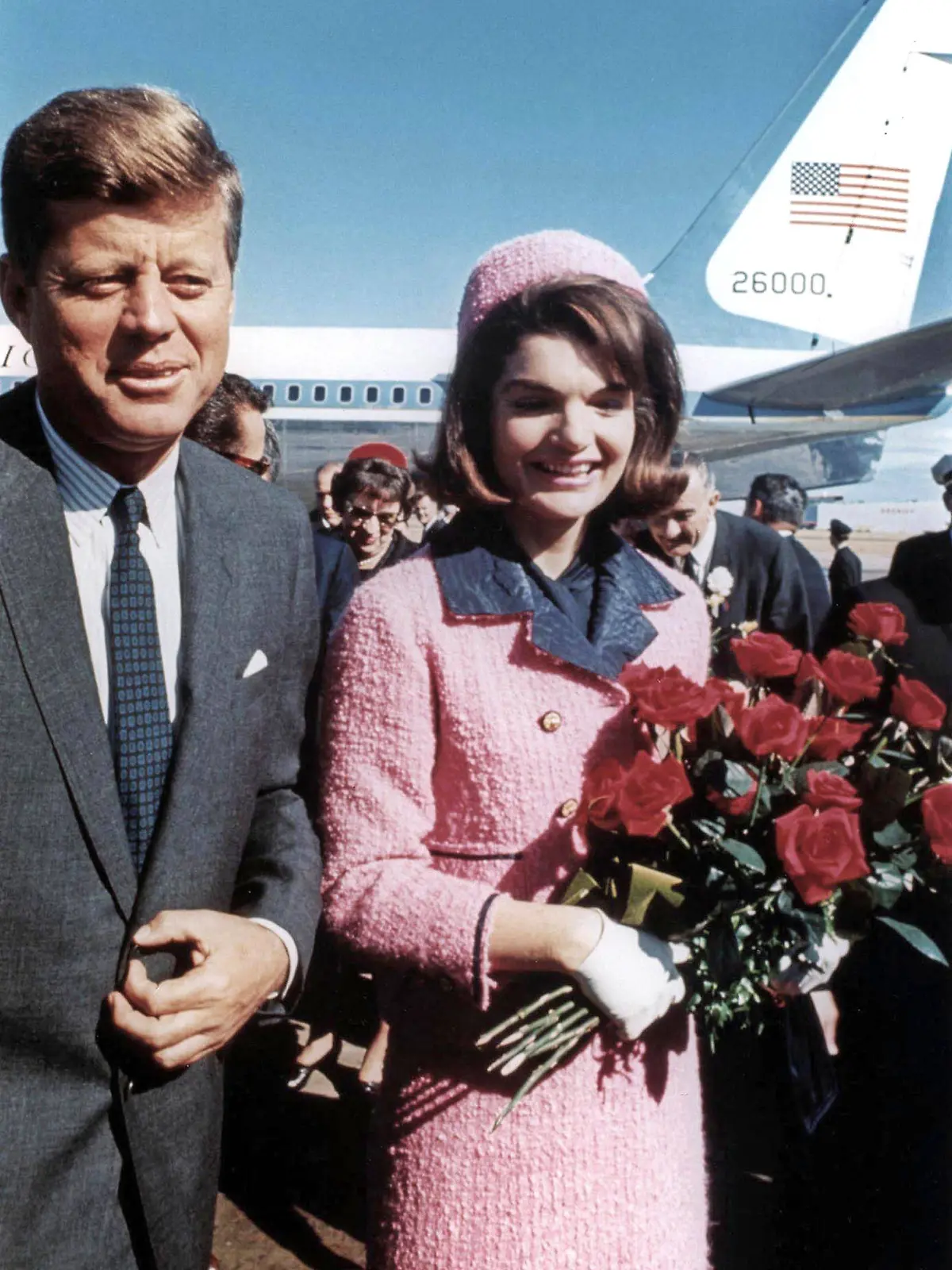 President John Kennedy and his wife Jackie arriving at Dallas airport, 1963 photo 1718786 President John Kennedy and his wife Jackie arriving at Dallas airport, 1963 photo by American Photographer, 20th century add.info.: President John Kennedy and his wife Jackie, wearing strawberry-pink Chanel suit , arriving at Dallas airport the day of John s assassination november 22, 1963.