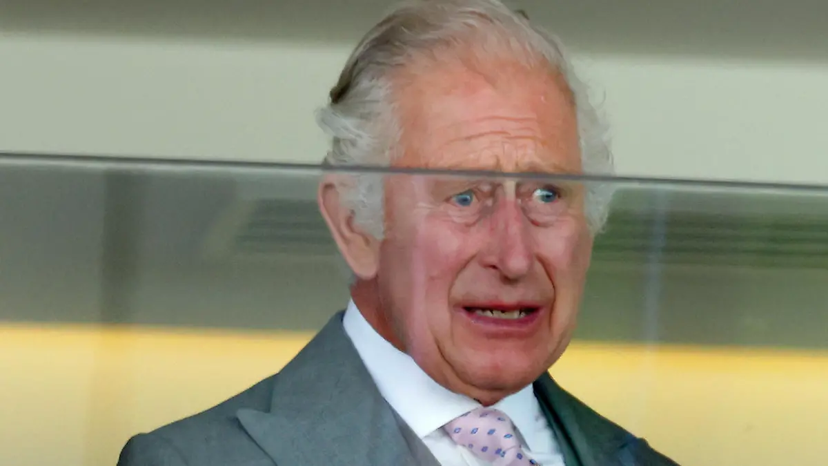 ASCOT, UNITED KINGDOM - JUNE 22: (EMBARGOED FOR PUBLICATION IN UK NEWSPAPERS UNTIL 24 HOURS AFTER CREATE DATE AND TIME) A visibly emotional King Charles III watches from the Royal Box after his horse 'Desert Hero' (which was bred by the late Queen Elizabeth II) won 'The King George V Stakes' on day 3 'Ladies Day' of Royal Ascot 2023 at Ascot Racecourse on June 22, 2023 in Ascot, England. (Photo by Max Mumby/Indigo/Getty Images)