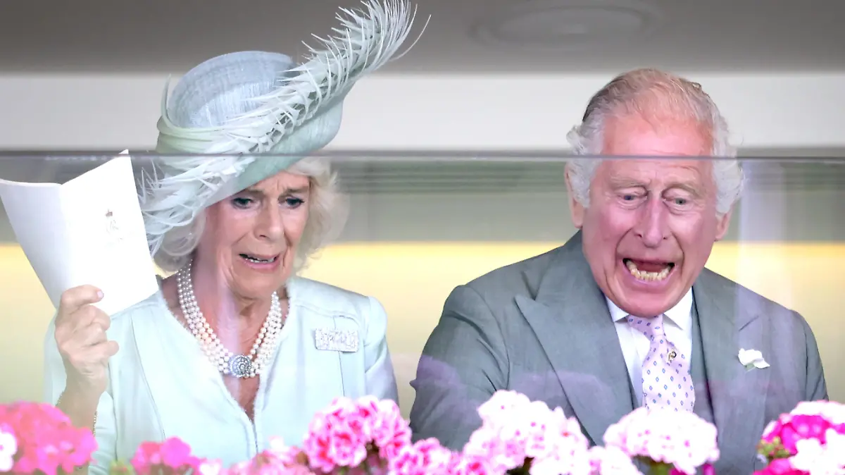 ASCOT, ENGLAND - JUNE 22: King Charles II and Queen Camilla watch their horse Desert Hero win The King George V Stakes as they attend day three of Royal Ascot 2023 at Ascot Racecourse on June 22, 2023 in Ascot, England. (Photo by Chris Jackson/Getty Images)