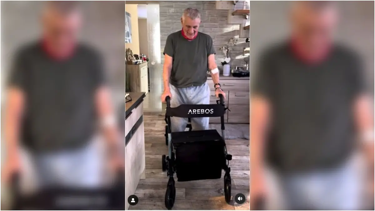 Heinz Hoenig macht seine ersten Schritte am Rollator.