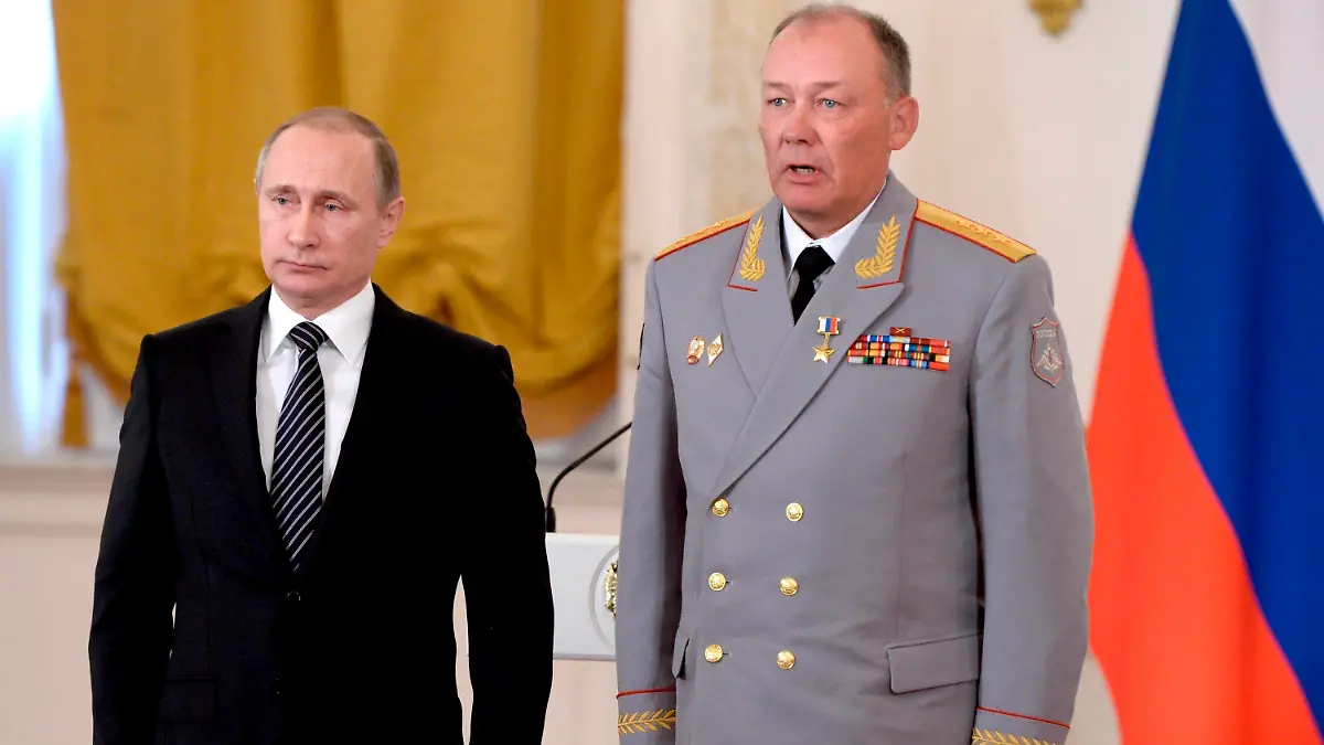 In this photo taken on March 17, 2016, Russian President Vladimir Putin, left, poses with Col. Gen. Alexander Dvornikov during an awarding ceremony in Moscow's Kremlin, Russia. Russia has appointed a new Ukraine war commander. A top U.S. official on Sunday, April 10, 2022 said Russia named Gen. Dvornikov as commander of an armed campaign that Russian authorities still refer to as a “special military operation." (Alexei Nikolsky/Sputnik, Kremlin Pool Photo via AP)