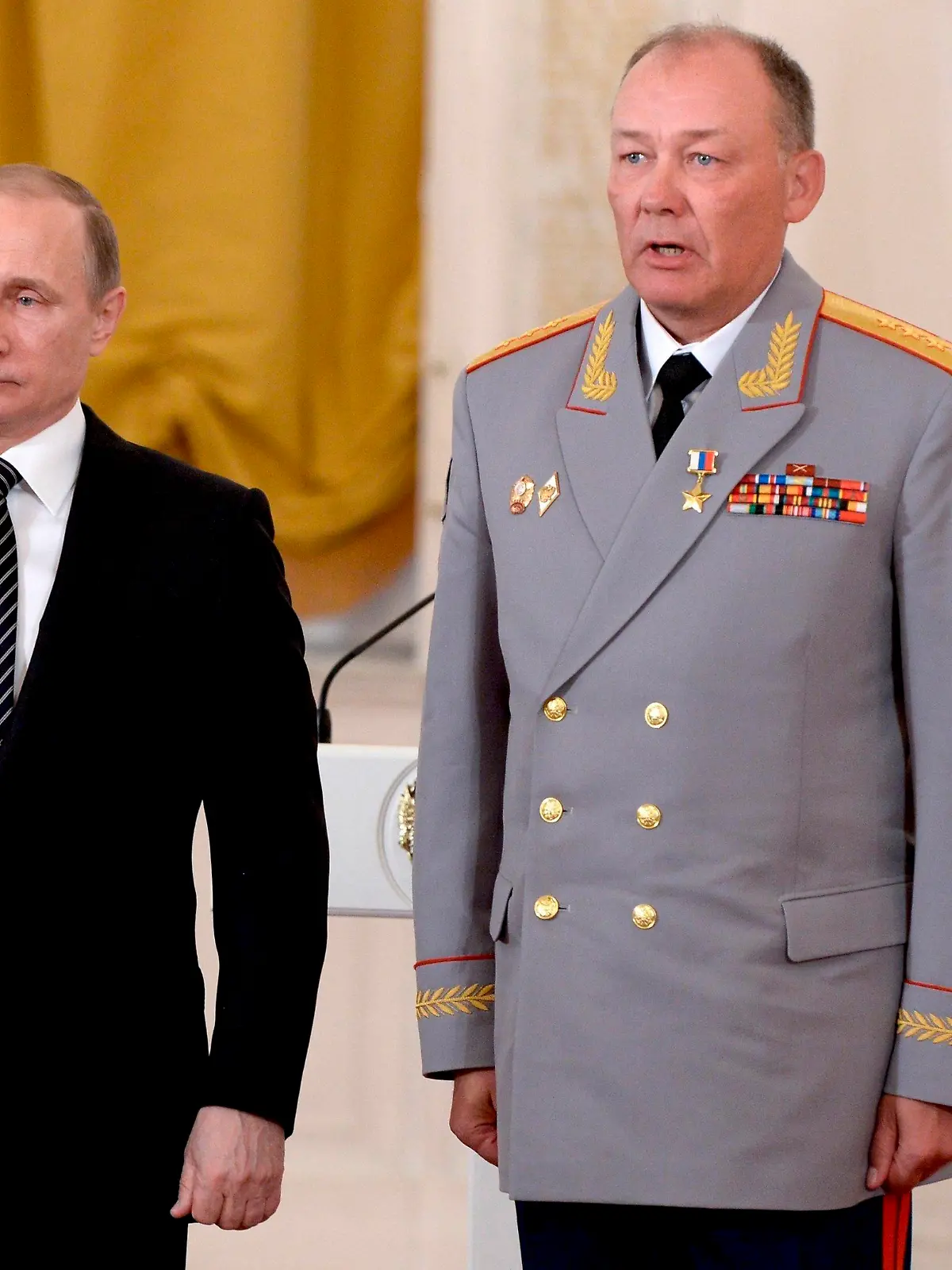 In this photo taken on March 17, 2016, Russian President Vladimir Putin, left, poses with Col. Gen. Alexander Dvornikov during an awarding ceremony in Moscow's Kremlin, Russia. Russia has appointed a new Ukraine war commander. A top U.S. official on Sunday, April 10, 2022 said Russia named Gen. Dvornikov as commander of an armed campaign that Russian authorities still refer to as a “special military operation." (Alexei Nikolsky/Sputnik, Kremlin Pool Photo via AP)