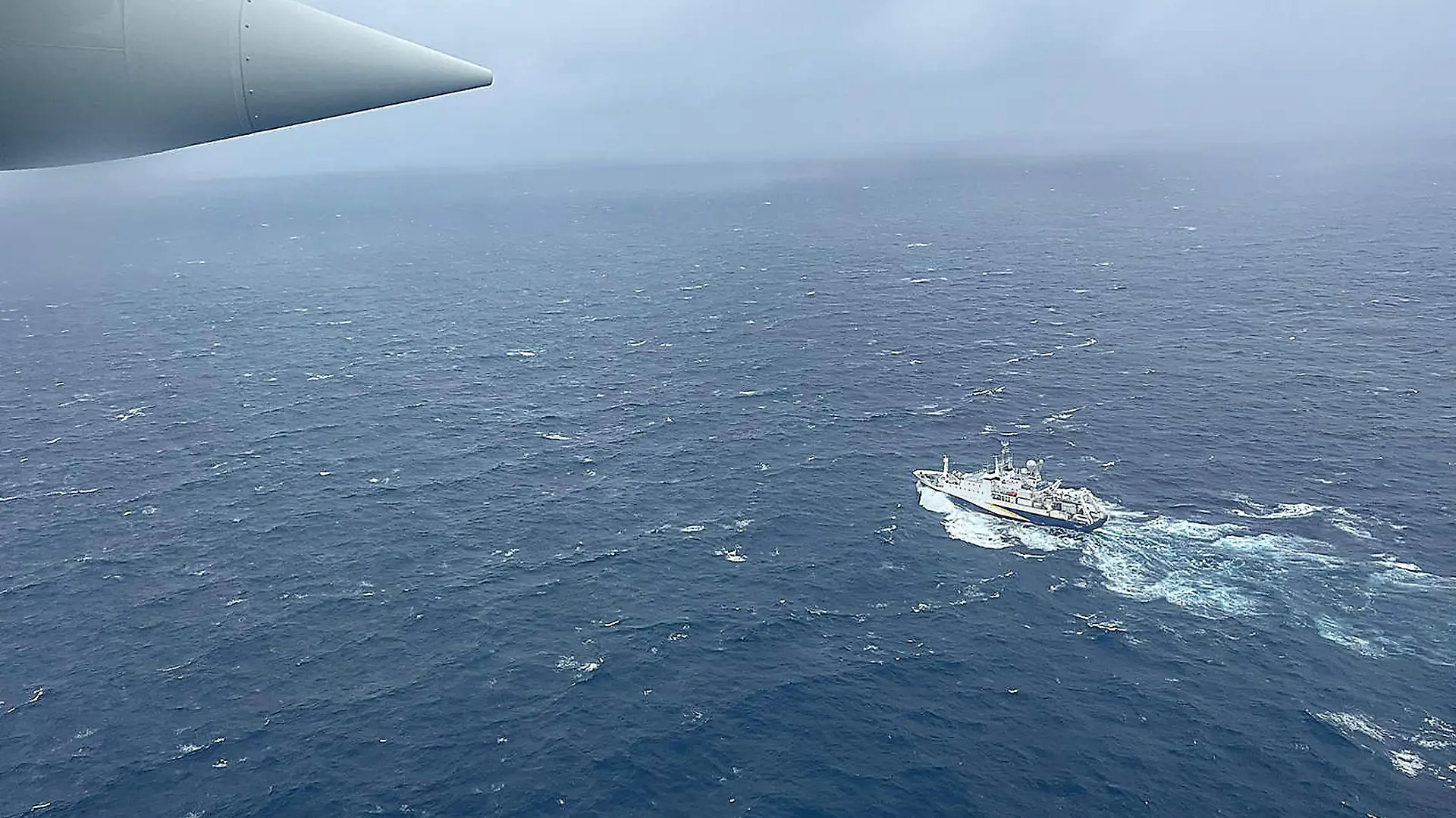 June 22, 2023, Boston, Massachusetts, USA: A handout photo taken on June 21, 2023 and made available June 22, 2023 by the US Coast Guard shows a Coast Guard Air Station Elizabeth City, North Carolina HC-130 Hercules airplane flies over the French research vessel, L Atalante approximately 900 miles East of Cape Cod during the search for the 21-foot submersible, Titan. Five people who were on a sub that went missing during a voyage to the wreckage of the Titanic are believed to be dead, the company that planned the trip said. The announcement was made after a deep-sea robot found a debris field while searching for the sub, the U.S. Coast Guard said Thursday. Boston USA - ZUMA 20230622_new_z03_031 Copyright: xPettyxOfficerx1stxClassxAmber/USxCoastxGuardx