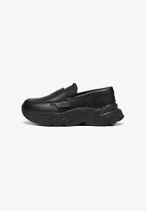 Puma Loafer in Schwarz mit dicker Sohle