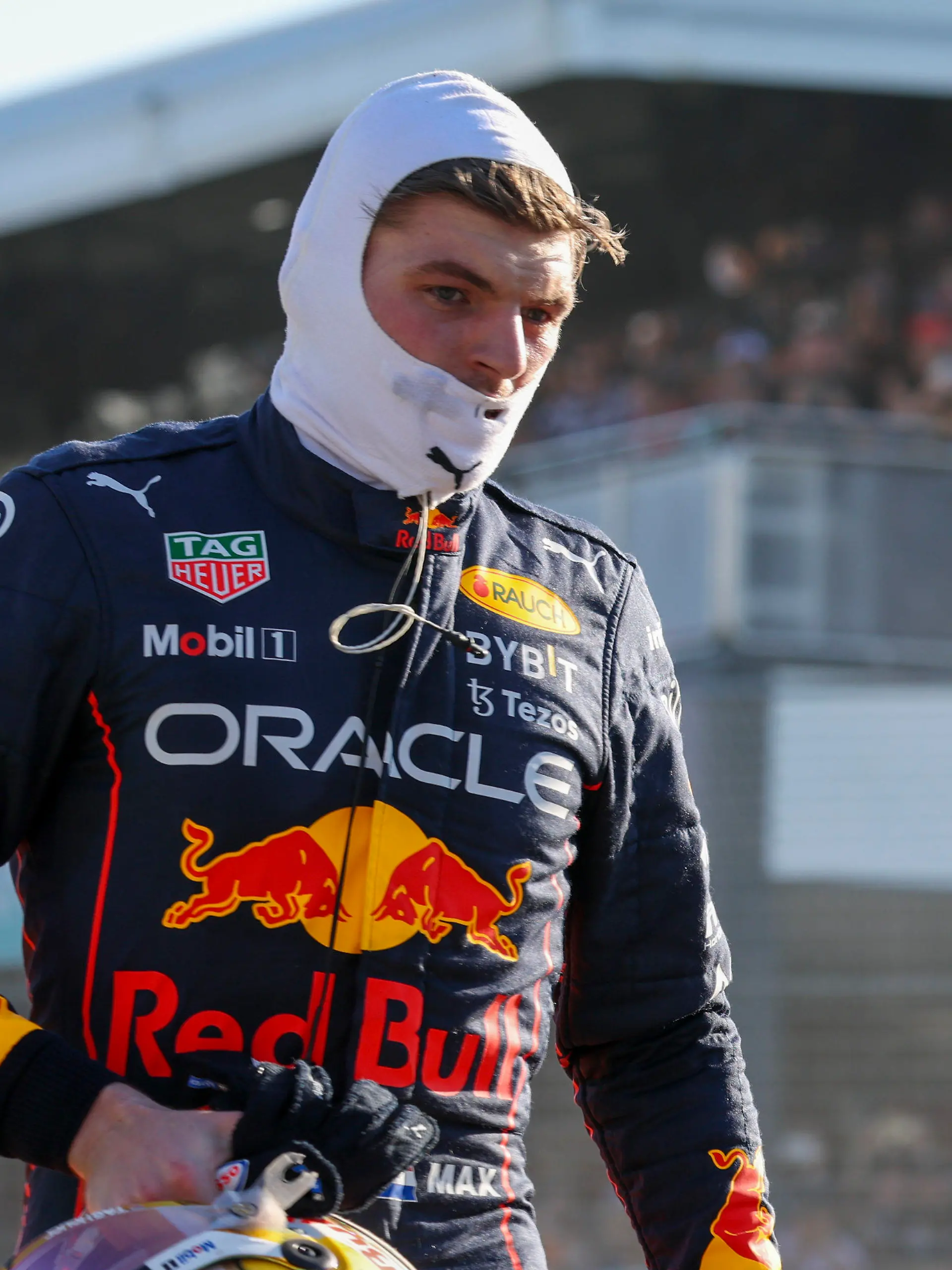 Red Bull driver Max Verstappen of the Netherlands walks from the circuit after he withdrew from the Australian Formula One Grand Prix in Melbourne, Australia, Sunday, April 10, 2022. (AP Photo/Asanka Brendon Ratnayake)