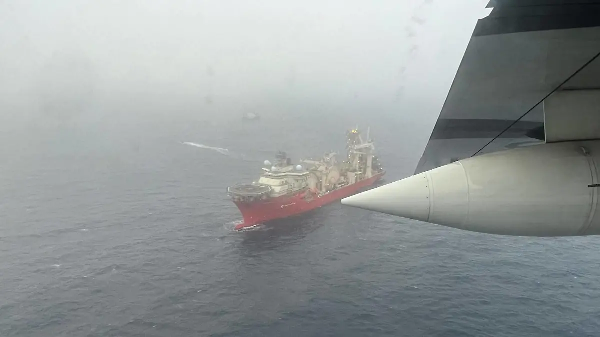This image shows the Bahamian research vessel, Deep Energy helping search for the submersible Titan on Tuesday 20June2023. Titan contains a crew of five, including British billionaire Hamish Harding, who were due to visit the wreck of the Titanic, the unsinkable ship which sunk in 1912. The U.S. Coast Guard, U.S. Navy, Canadian CoastnGuard and OceanGate Expeditions have established a unified command to search for the 21-foot submersible research vessel which went missing after losing contact with the Research Vessel Polar Prince on Sunday evening. Deep Energy arrived on the scene around 7 a.m. EDT on Tuesday and began remotely operated vehicle ROV operations. A C-130 crew from the Air National Guard 106th also arrived on PUBLICATIONxNOTxINxUKxFRA Copyright: xx 52829752