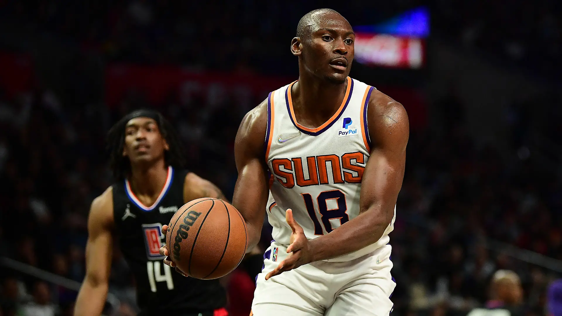 Apr 6, 2022; Los Angeles, California, USA; Phoenix Suns center Bismack Biyombo (18) controls the ball against the Los Angeles Clippers during the second half at Crypto.com Arena. Mandatory Credit: Gary A. Vasquez-USA TODAY Sports