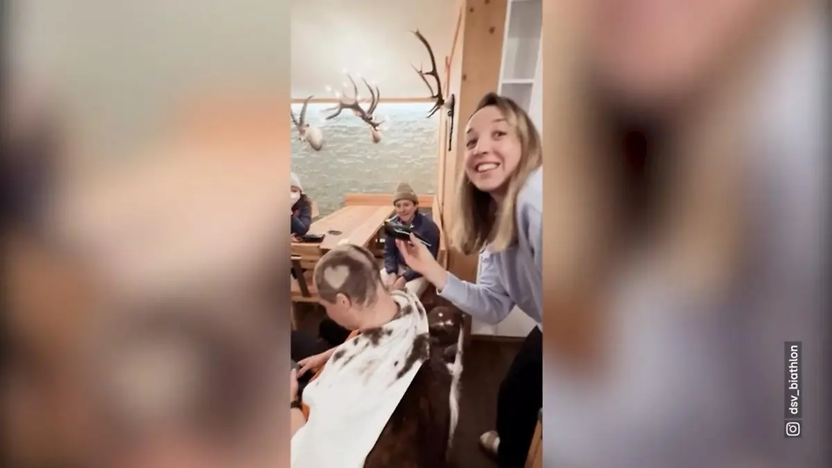 Biathlon-Weltmeisterin rasiert ihren Trainern die Köpfe Goldmedaille macht´s möglich