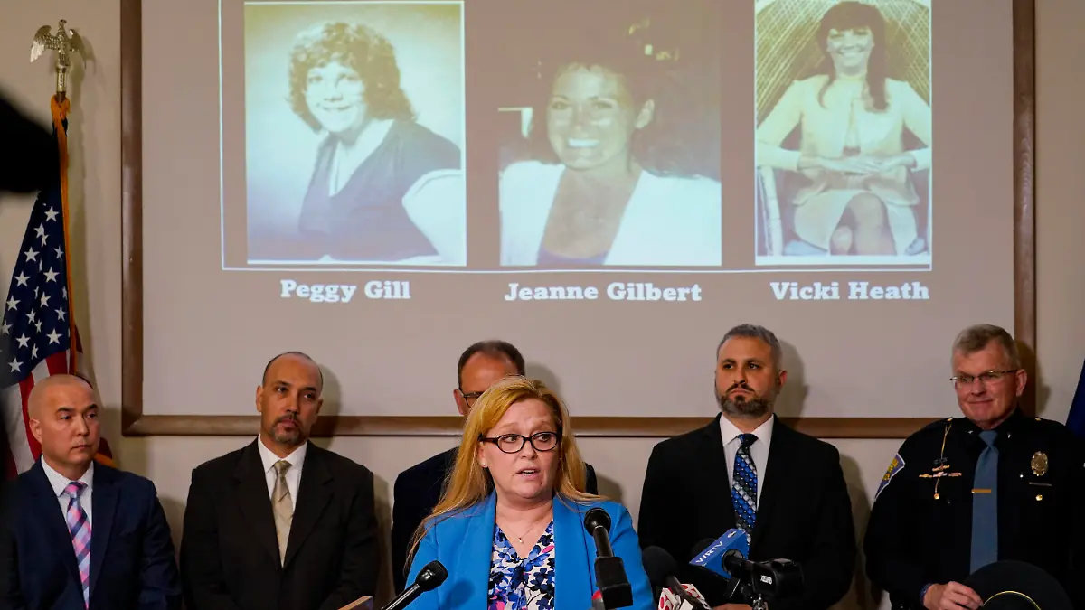 Kim Gilbert Wright, daughter of Jeanne Gilbert, speaks after the Indiana State announced the identity of the suspect in the "Days Inn" cold case murders during a press conference in Indianapolis, Tuesday, April 5, 2022. Jeanne Gilbert was one of three women killed from 1987 to 1989. Police identified the suspect as Harry Edward Greenwell more than 30 years after three women were killed and another assaulted using investigative genealogy. (AP Photo/Michael Conroy)
