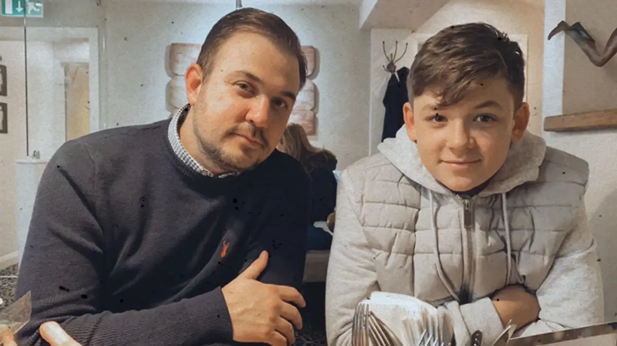 PIC FROM Kennedy News and Media (PICTURED: CALUM COURTNEY, 14, AND DAD DAVID, 38, FROM BASILDON, ESSEX) A teen is so allergic to the COLD that his parents have to whack the heating on full all day every day and drive him to school - as they're 'terrified' he could die if he walked. Calum Courtney, 14, suffers with from a condition called cold urticaria meaning he can't go outside the house for more than 15 minutes without his skin breaking into red and itchy rashes. The allergy is so bad that Calum breaks out in hives if the temperature is less than 24 degrees or if an arm or leg isn't covered by the duvet while he's sleeping.DISCLAIMER: While Kennedy News and Media uses its best endeavours to establish the copyright and authenticity of all pictures supplied, it accepts no liability for any damage, loss or legal action caused by the use of images supplied and the publication of images is solely at your discretion. SEE KENNEDY NEWS COPY - 0161 697 4266