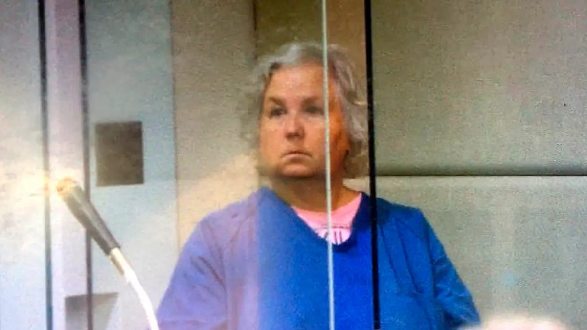 FILE - In this screen shot from video of her court appearance, romance writer Nancy Crampton Brophy appears in Multnomah County Circuit Court in Portland, Ore., on Sept. 6, 2018, on one count of murder with a firearm constituting domestic violence in the June death of her husband, Daniel Brophy, a chef at the Oregon Culinary Institute who was found shot in the school's kitchen. Crampton Brophy's trial started Monday, April 4, 2022. (Multnomah County Circuit Court/Courtesy of The Oregonian via AP, File)