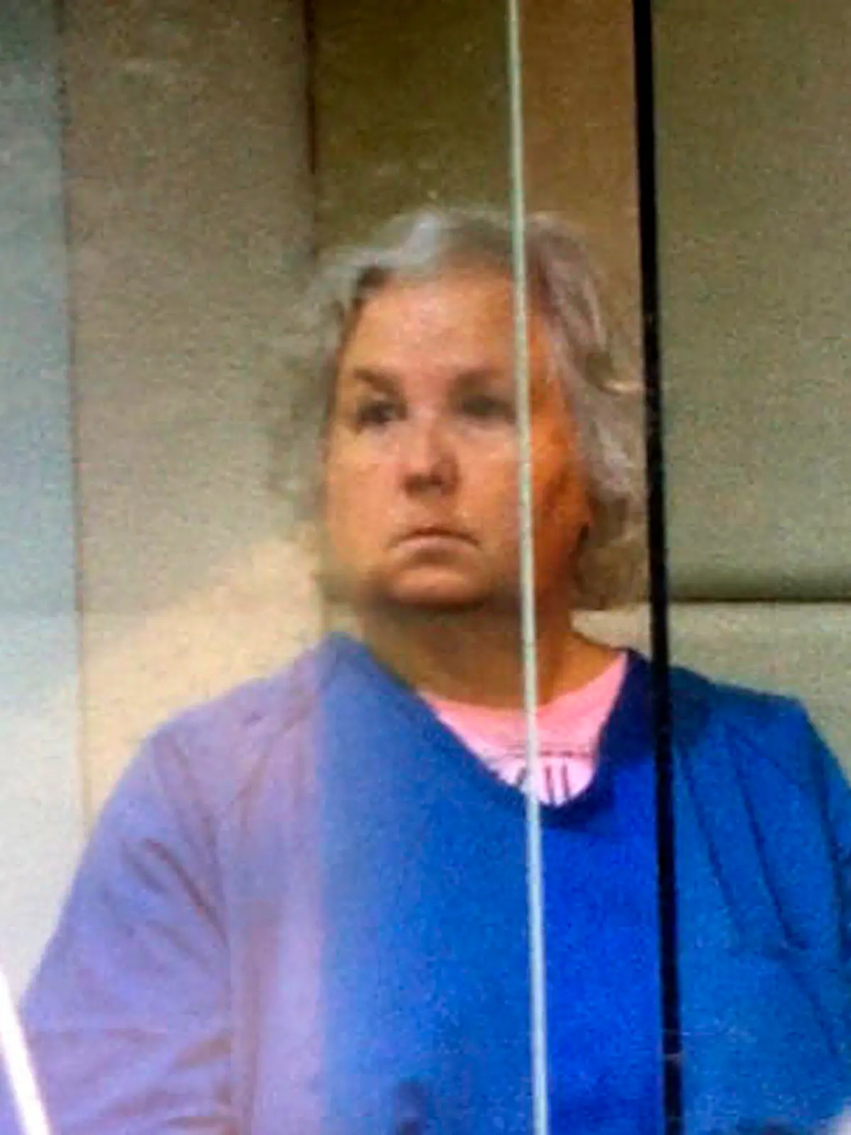 FILE - In this screen shot from video of her court appearance, romance writer Nancy Crampton Brophy appears in Multnomah County Circuit Court in Portland, Ore., on Sept. 6, 2018, on one count of murder with a firearm constituting domestic violence in the June death of her husband, Daniel Brophy, a chef at the Oregon Culinary Institute who was found shot in the school's kitchen. Crampton Brophy's trial started Monday, April 4, 2022. (Multnomah County Circuit Court/Courtesy of The Oregonian via AP, File)
