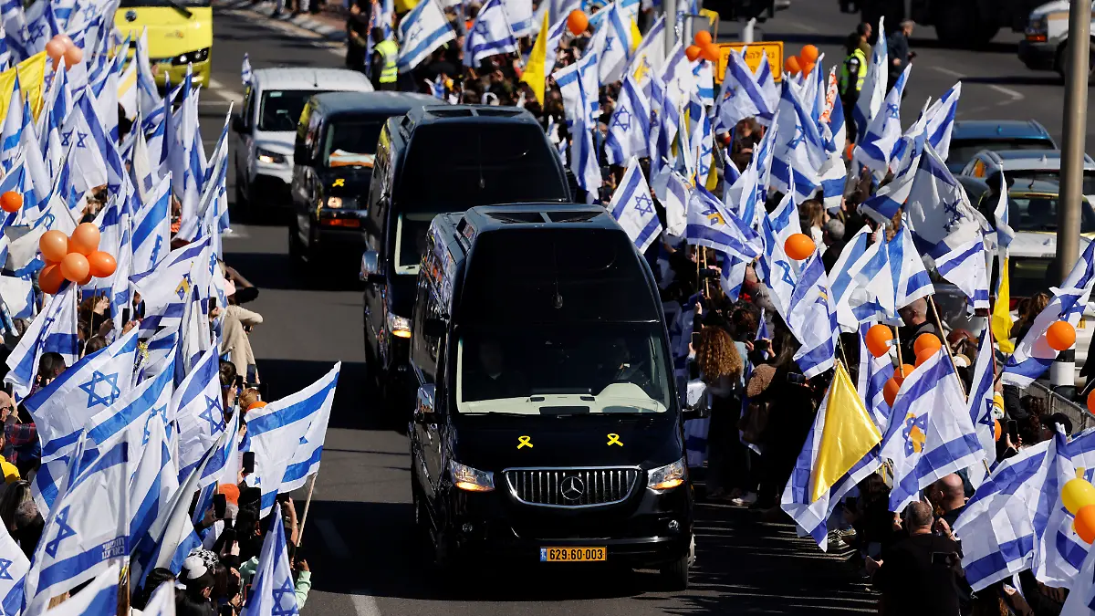 Israelis gather to bid farewell to Shiri, Ariel and Kfir Bibas, in Ashkelon