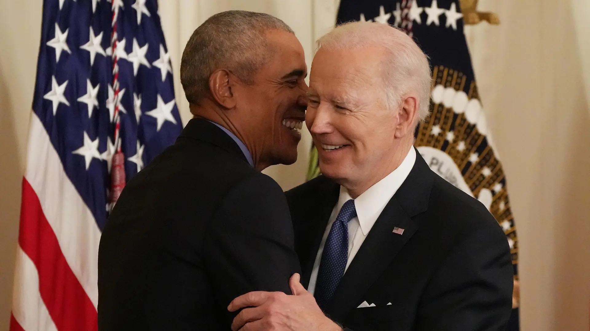 Former President Barack Obama hugs President Joe Biden as they join Vice President Kamala Harris (not seen) during a ceremony on the Affordable Care Act and lowering health care costs for families, at the White House in Washington, DC on Tuesday, April 5, 2022. Photo by Pat Benic/UPI Photo via Newscom picture alliance