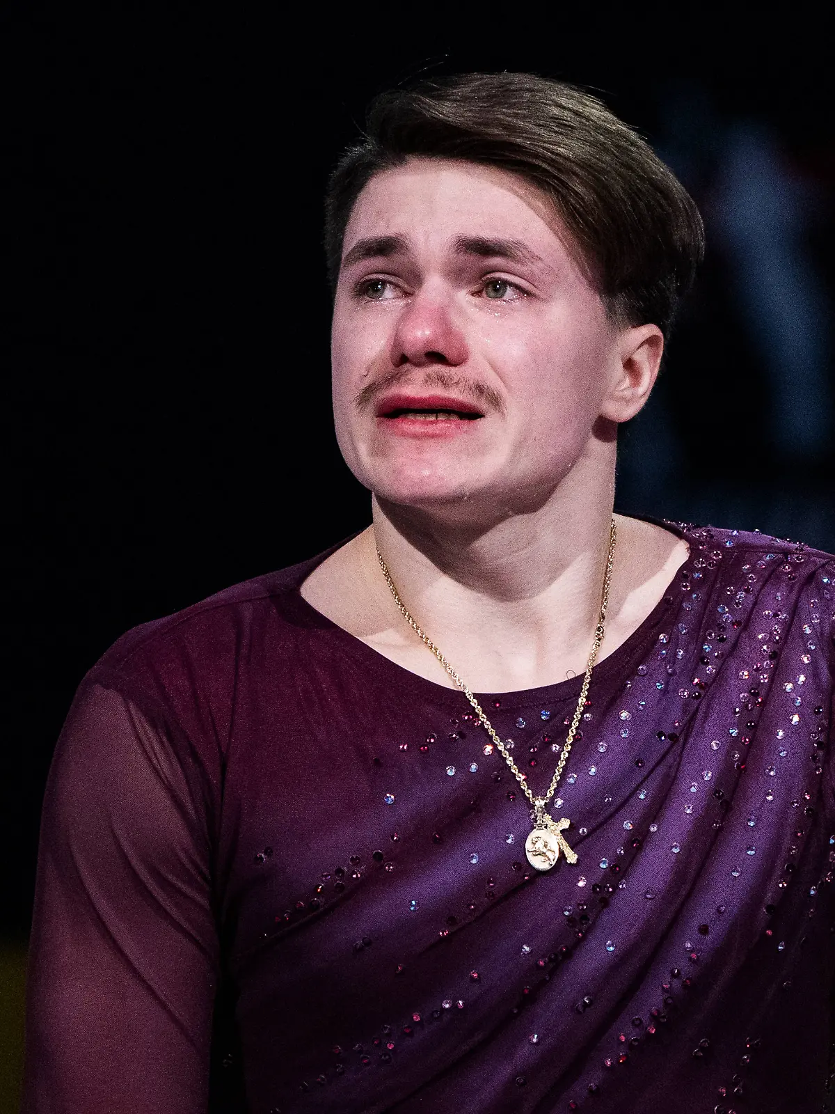 Maxim Naumov fließen die Tränen über das Gesicht.