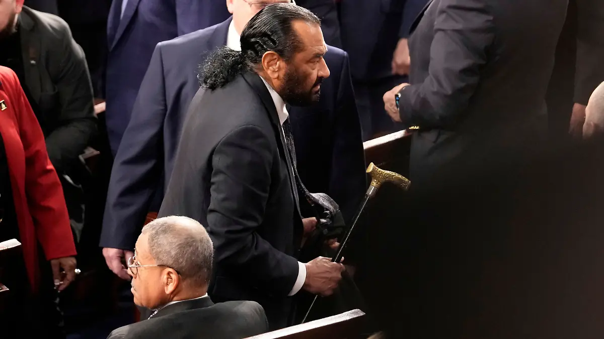 Rep. Al Green, D-Texas, is escorted out as President Donald Trump addresses a joint session of Congress at the Capitol in Washington, Tuesday, March 4, 2025. (AP Photo/Ben Curtis)