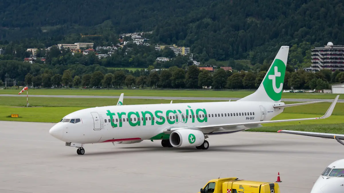 Innsbruck, Tyrol, Austria, august 12th 2016, daytime side view close-up of a Transavia Boeing 737-800 that has just landed at Innsbruck Airport - Transavia Airlines C.V. is a Dutch, Amsterdam based low-cost airline owned by KLM Royal Dutch Airlines - the 737-800 is a third generation Boeing 737 and was launched in 1998