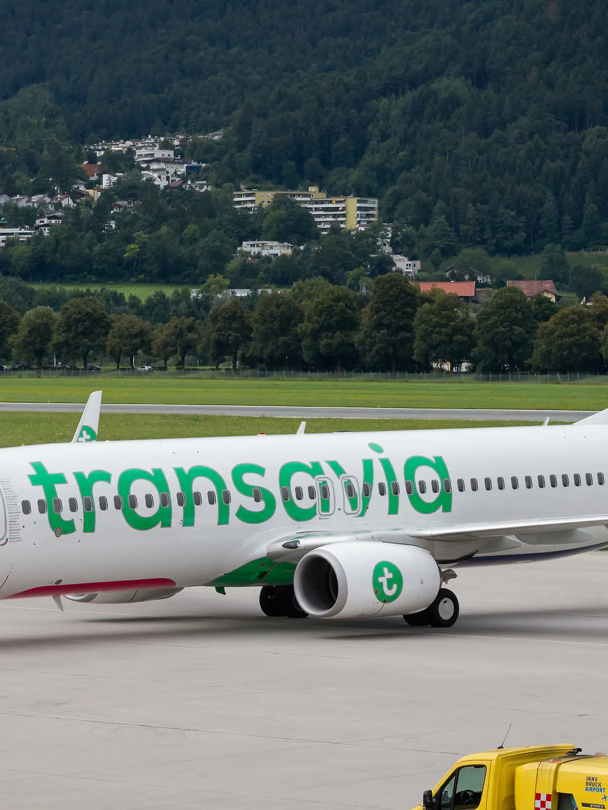 Innsbruck, Tyrol, Austria, august 12th 2016, daytime side view close-up of a Transavia Boeing 737-800 that has just landed at Innsbruck Airport - Transavia Airlines C.V. is a Dutch, Amsterdam based low-cost airline owned by KLM Royal Dutch Airlines - the 737-800 is a third generation Boeing 737 and was launched in 1998