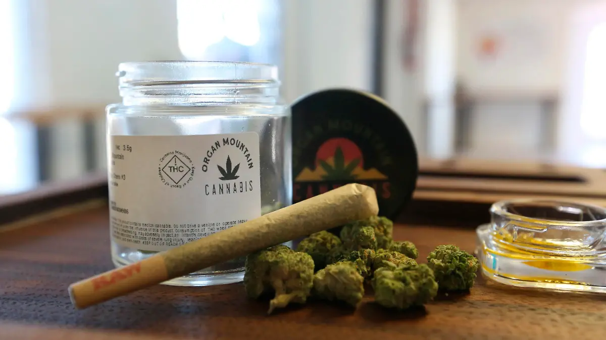 A pre-rolled joint and cannabis flower are pictured at Organ Mountain Cannabis, a new dispensary on Lohman Avenue in Las Cruces, N.M. on April 1, 2022, the first day of recreational sales in New Mexico. (Michael McDevitt/The Las Cruces Sun News via AP)