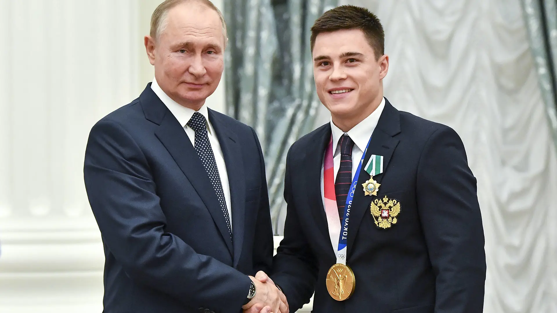 MOSCOW, RUSSIA - SEPTEMBER 11, 2021: Russias President Vladimir Putin L poses with artistic gymnast Nikita Nagorny during an award ceremony for Tokyo 2020 medalists at the Moscow Kremlin. Yevgeny Biyatov/POOL/TASS PUBLICATIONxINxGERxAUTxONLY TS1100B9