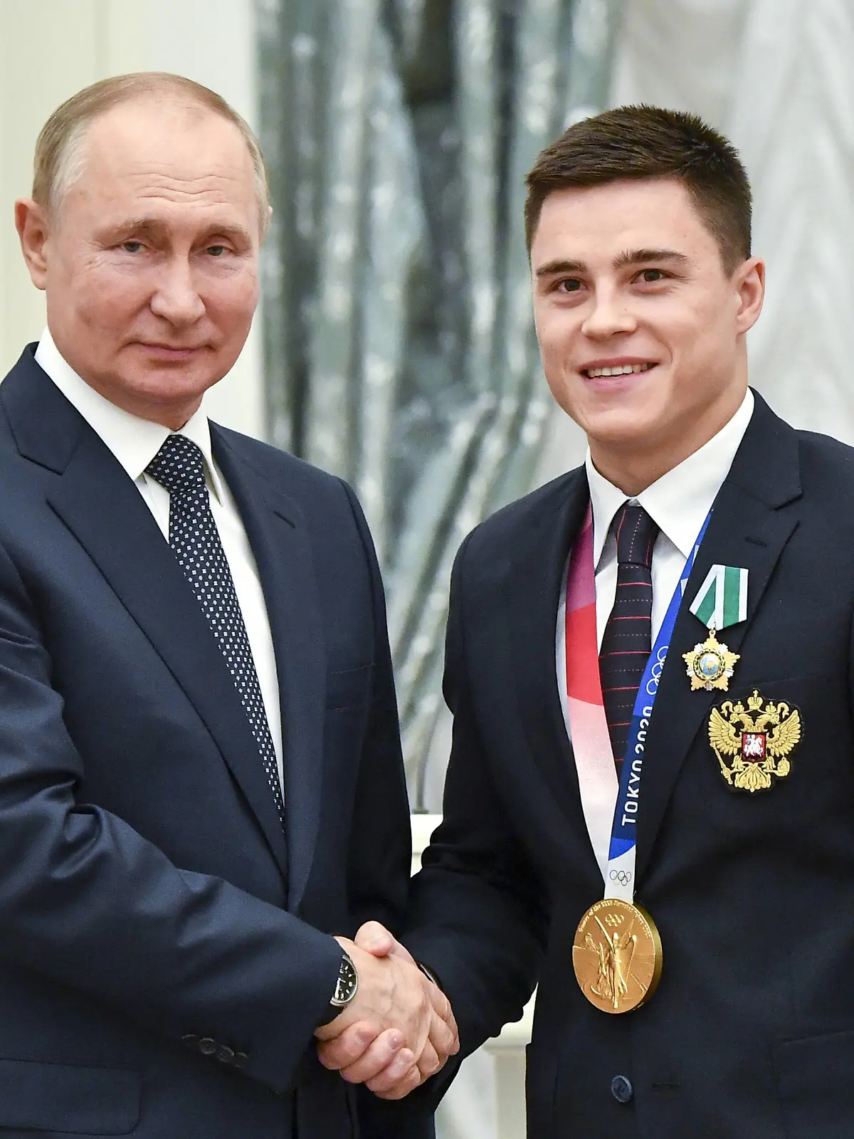 MOSCOW, RUSSIA - SEPTEMBER 11, 2021: Russias President Vladimir Putin L poses with artistic gymnast Nikita Nagorny during an award ceremony for Tokyo 2020 medalists at the Moscow Kremlin. Yevgeny Biyatov/POOL/TASS PUBLICATIONxINxGERxAUTxONLY TS1100B9 