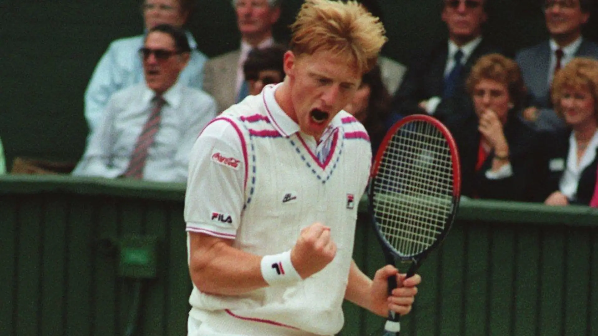 Boris Becker celebrates his victory over Stefan Edberg in the men's singles final at Wimbledon, July 9, 1989. (AP Photo/John Redman)