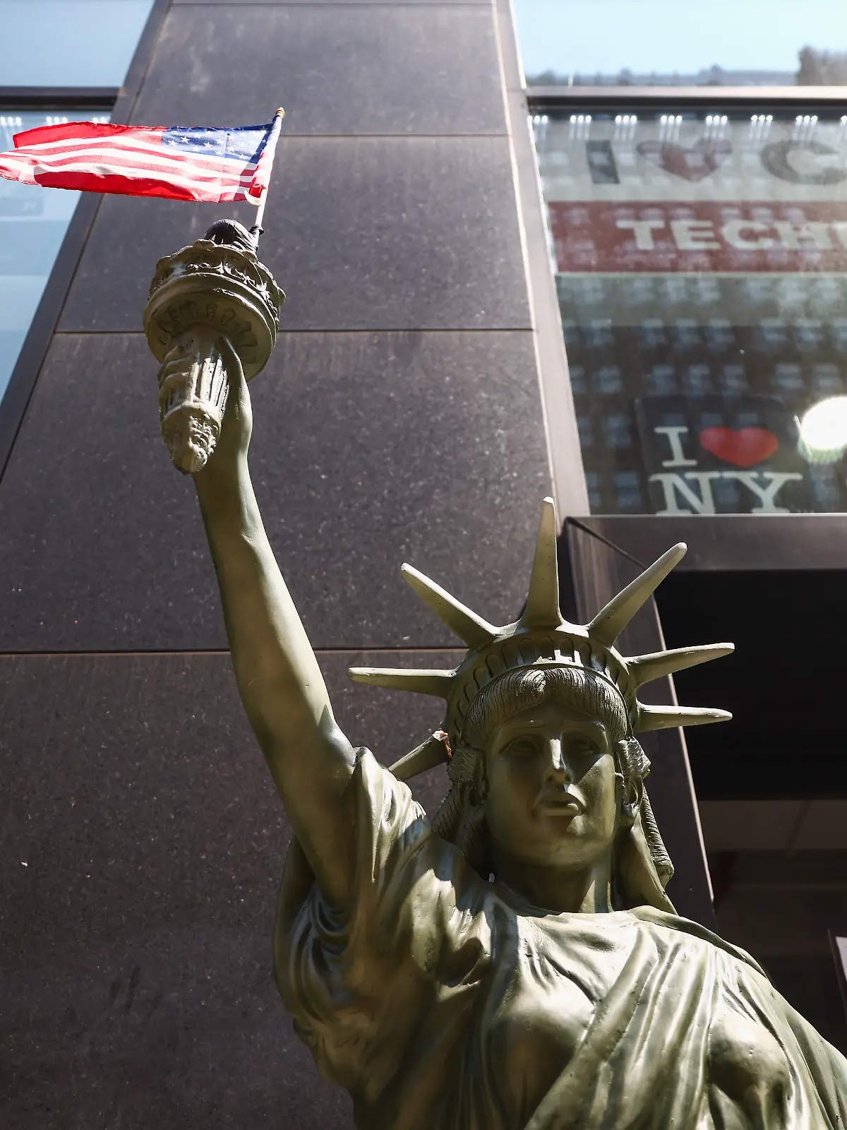 A Statue of Liberty figure is seen in front of a gift shop in Manhattan, New York City, United States of America on July 16th, 2024. 