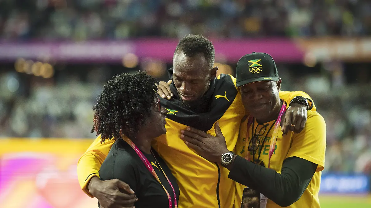 Usain Bolt mit Mutter Jennifer Bolt und Vater Wellesley
