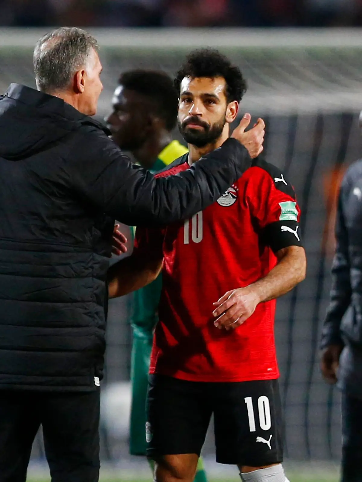 Soccer Football - World Cup - African Qualifiers - Egypt v Senegal - Cairo International Stadium, Cairo, Egypt - March 25, 2022 Egypt's Mohamed Salah celebrates with coach Carlos Queiroz after the match REUTERS/Amr Abdallah Dalsh